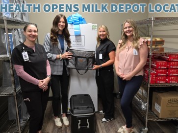 Article image:  CCM Health team accepting the first Milk Depot donation.